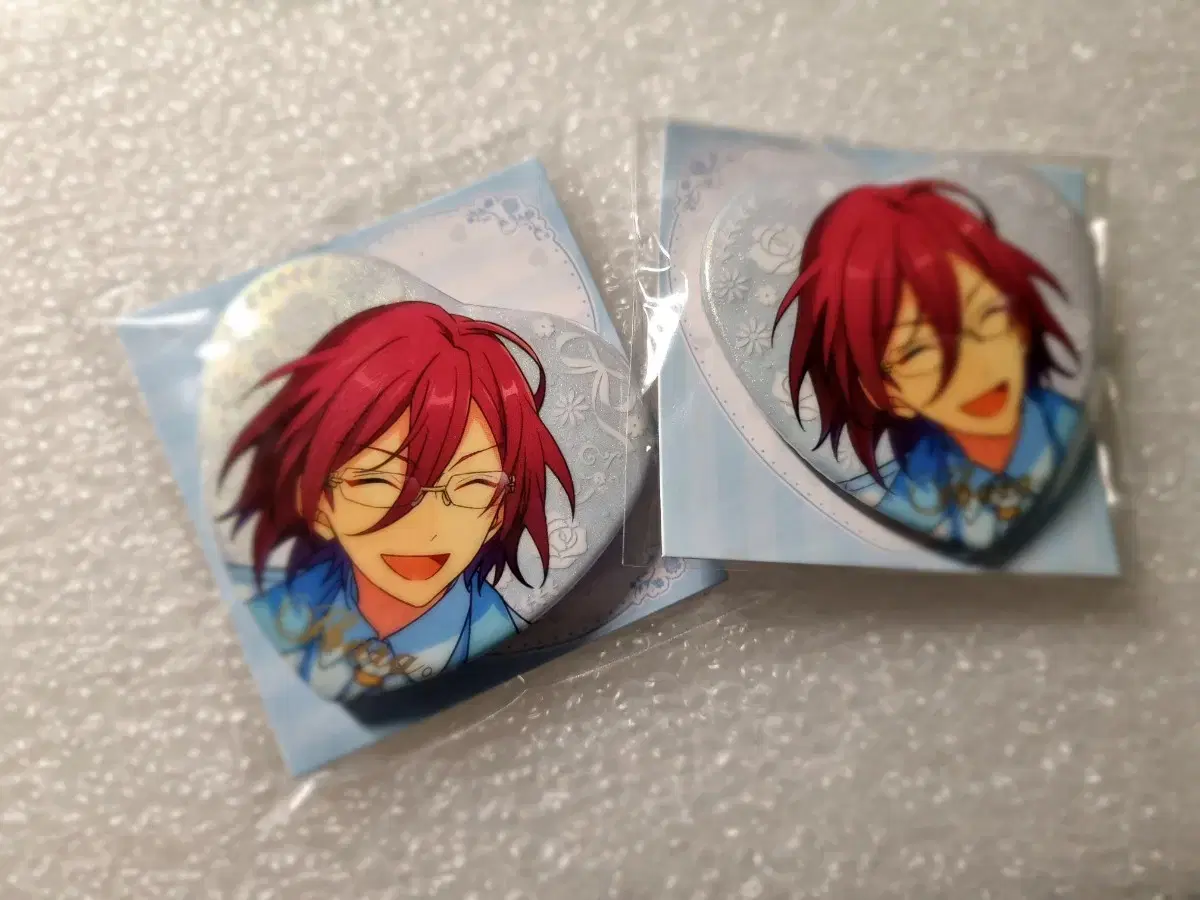 I'm selling 2 Angsta Zhongstar Ibarra Heart Pledge Badges