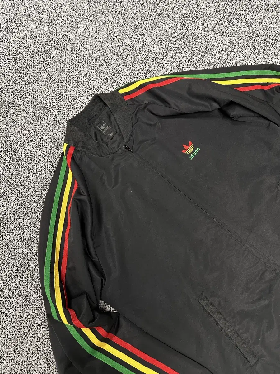 (100) Adidas Jamaica Goofybird padded jacket