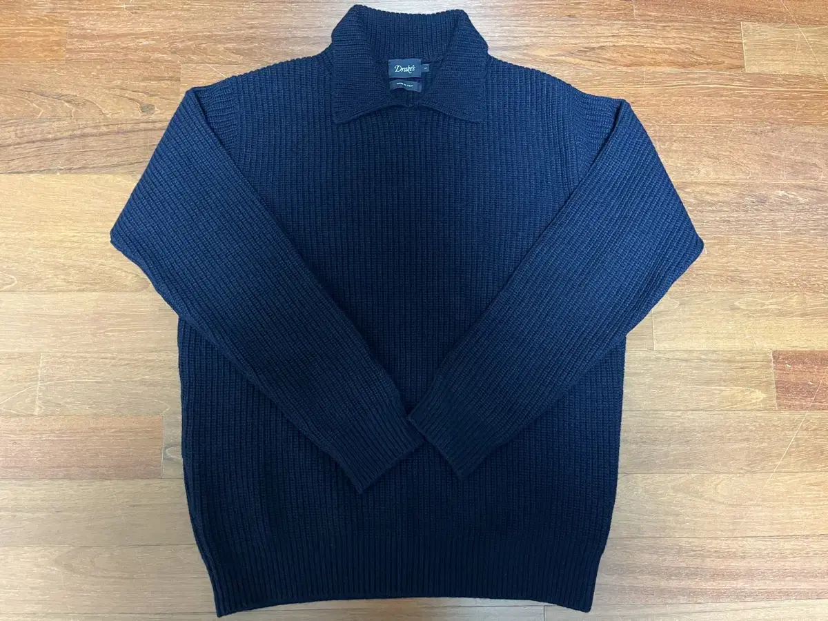 Drex Integral kara sells a size L in knit navy.