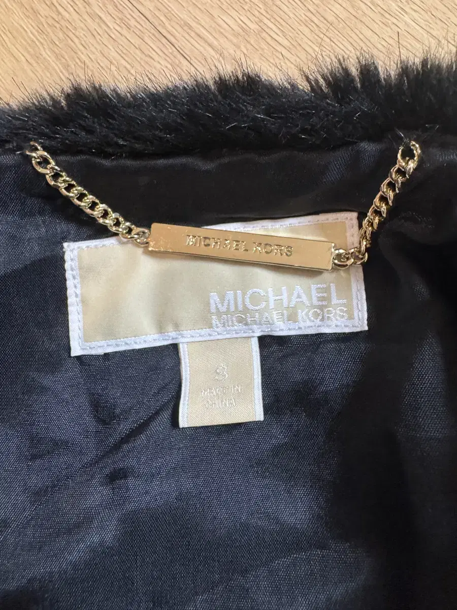 Michael kors 마이클코어스 인조퍼 베스트