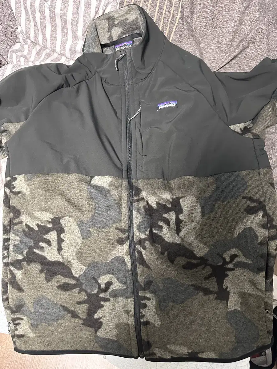 Patagonia camo design jacket in size 105