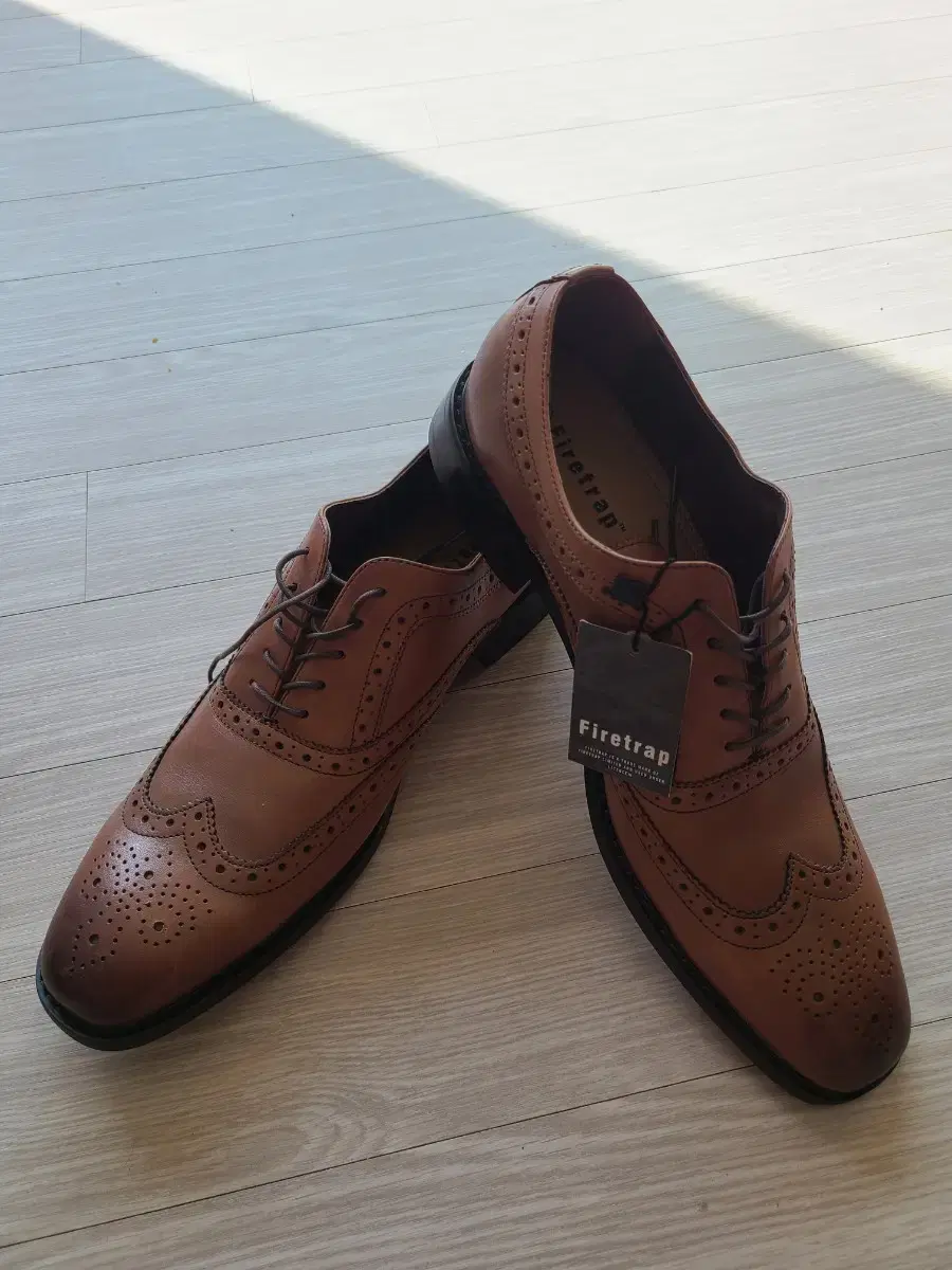 Brown-colored men's shoes