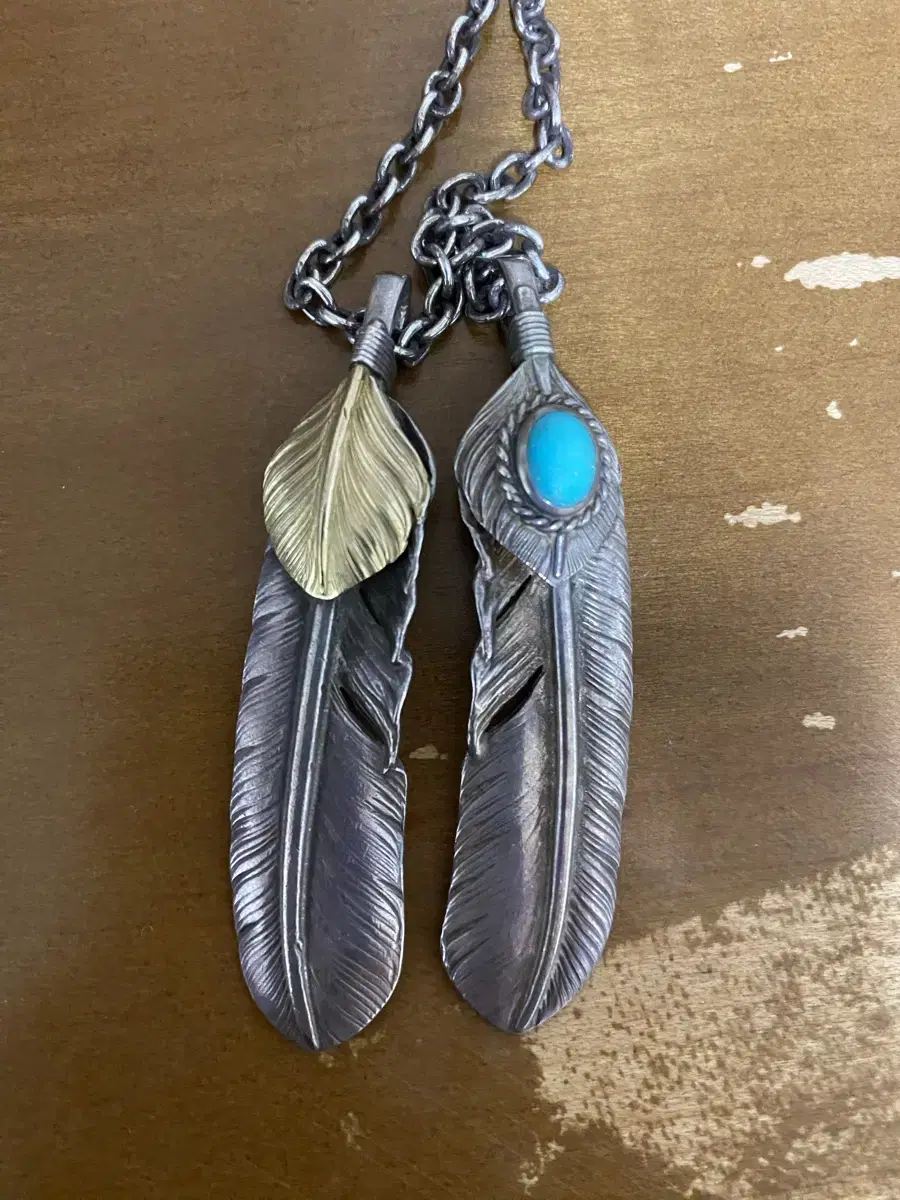 GOROS Feather Prize Left & Turquoise Right