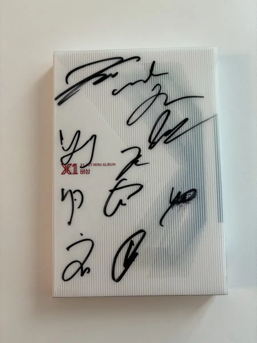 X1 autographed album Emergency