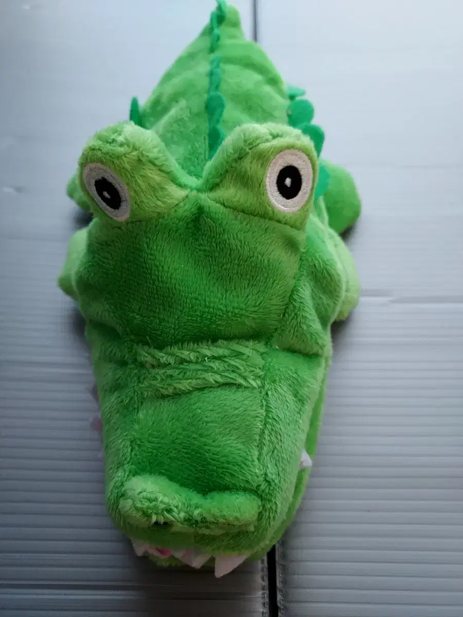 Alligator-hand doll