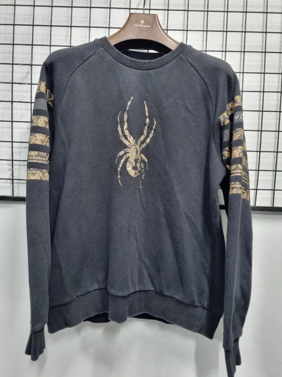 105XL Spider Reflective Top.