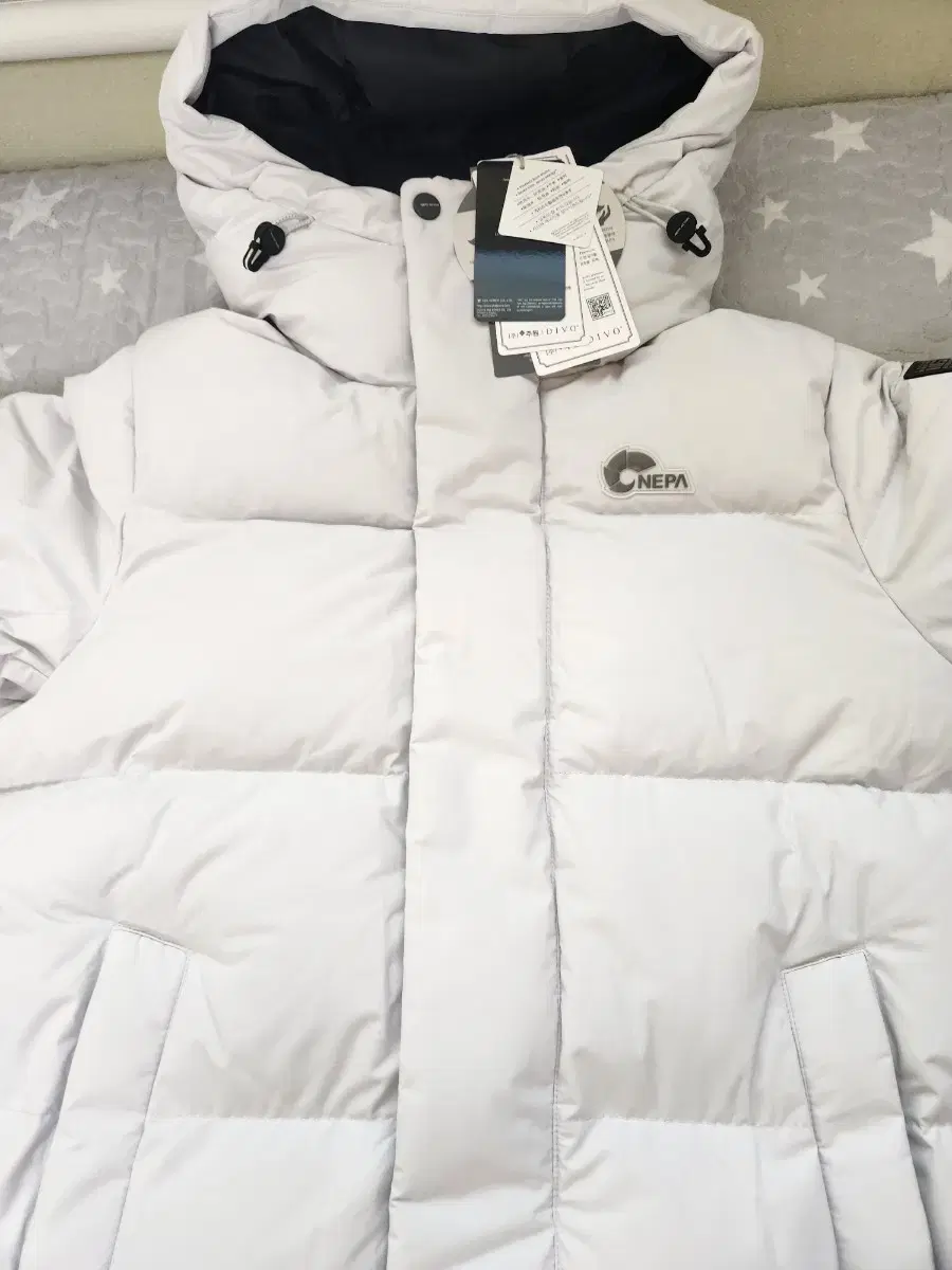 (Quick sale, unused)Nepa 95 white long padded jacket for sale.