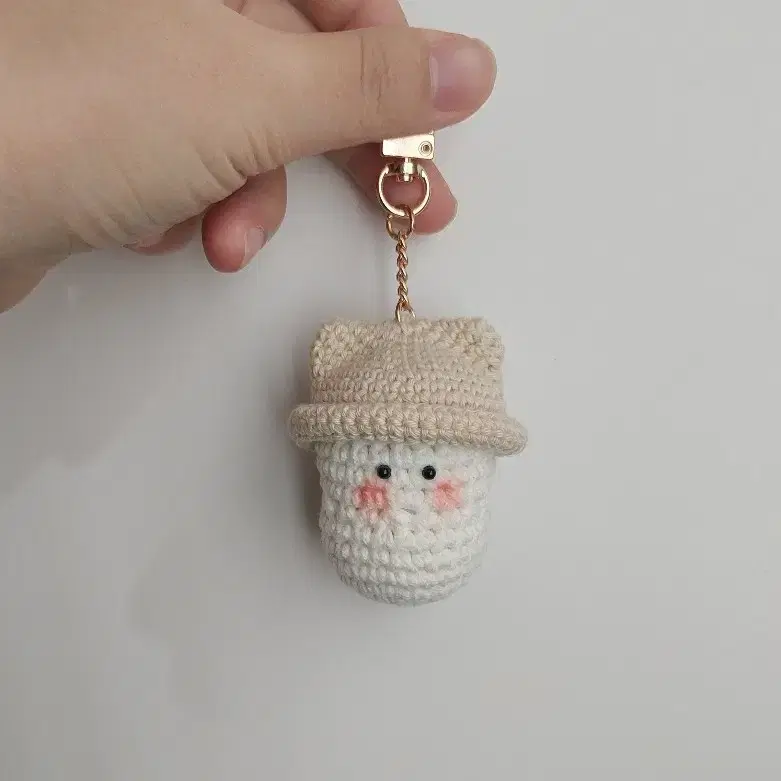 Light beige handmade crocheted keyring