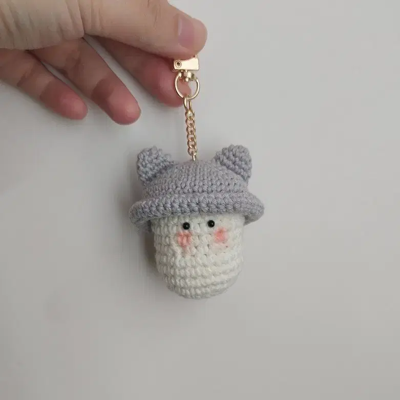 Light gray handmade crocheted keyring