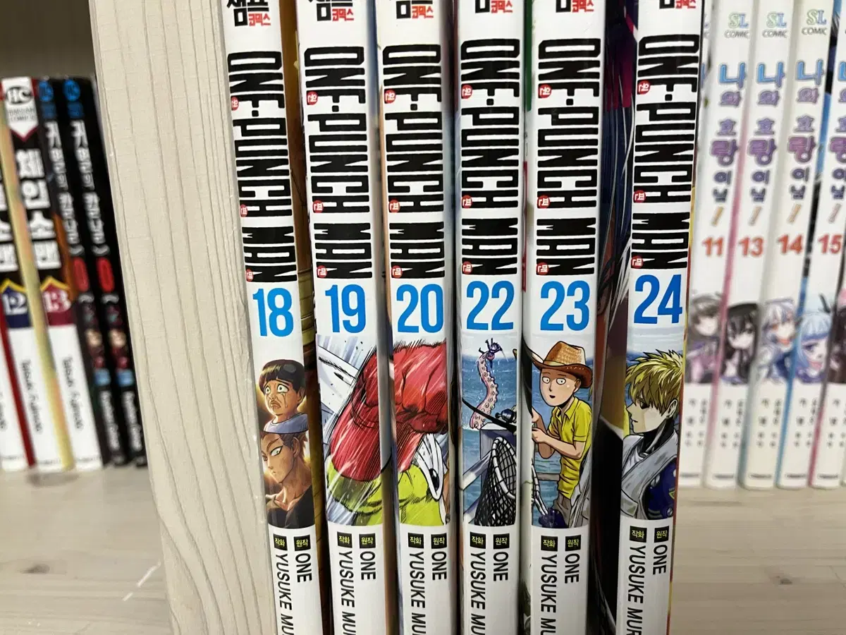 One Punch Man volumes 18-24 (excluding volume 21)