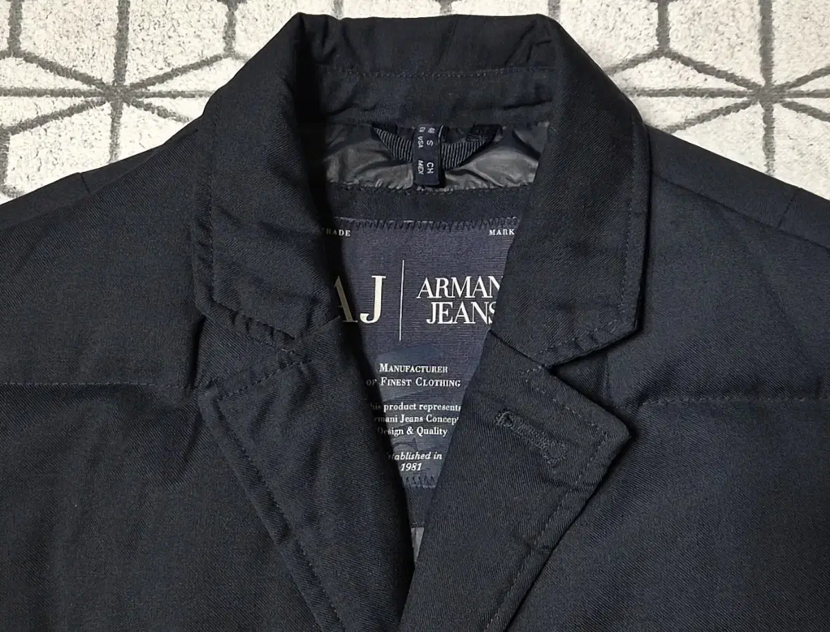 Armani jin sells genuine down padded blazer