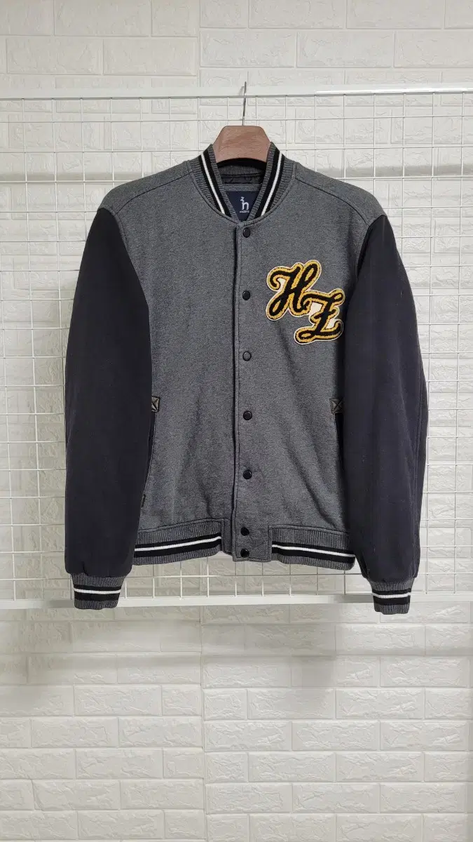 [100]HAZZYSHedges charcoal-gray pocketed leather baseball jumper Varsity L