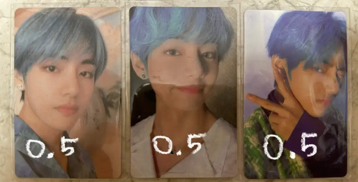 MapSol Taehyung sells photocard.