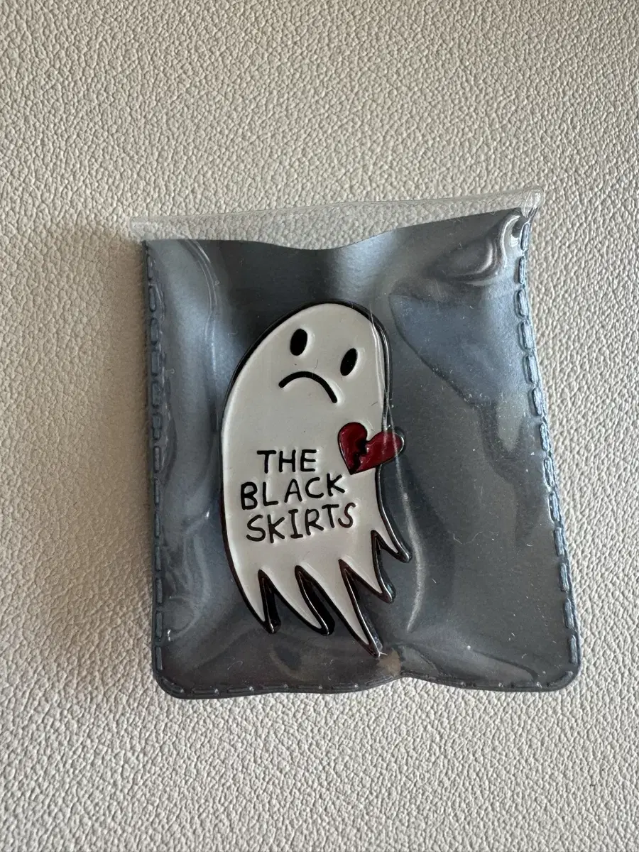 Black Skirt Ghost Badge