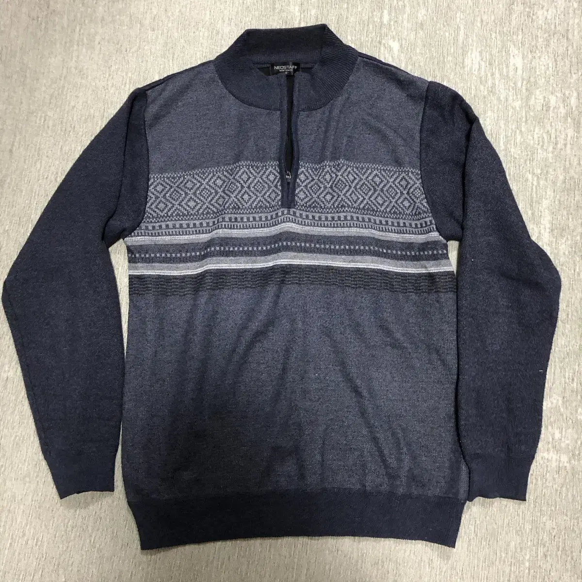 (Shown here) Navy anorak knit