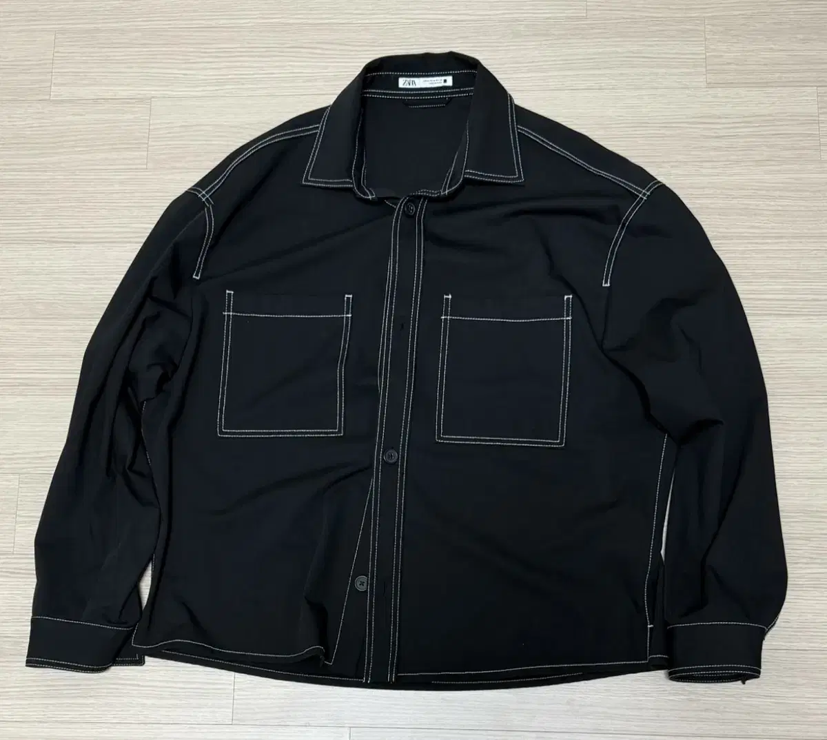 Sell me Zara [contrast stitch overshirt].