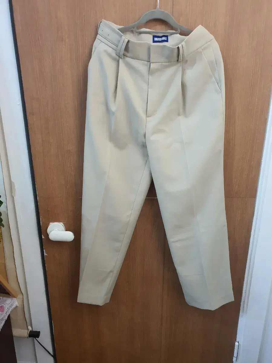 Invisible belted slacks size M