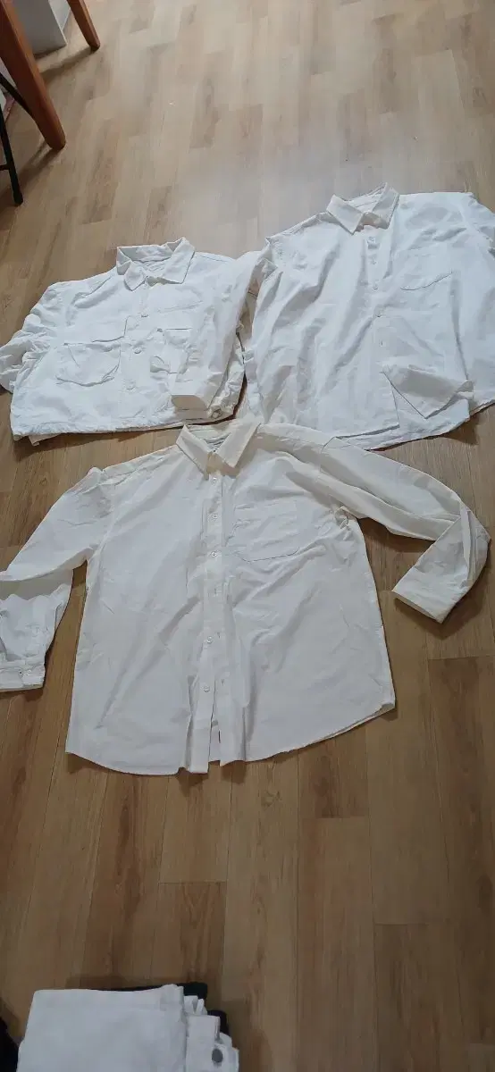 Includes 3 white shirts and a cropped jacket