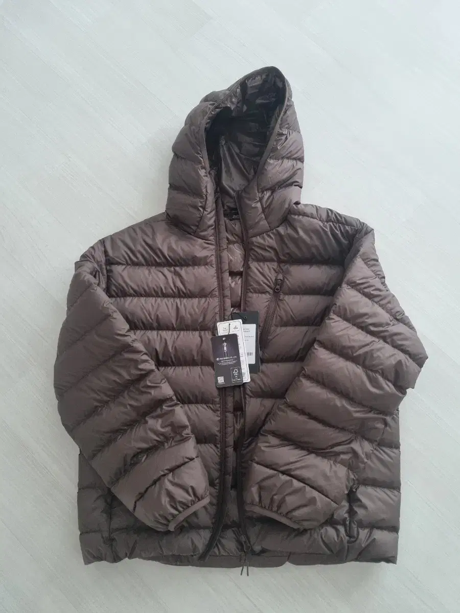 Mushinsa CityLeisure Hooded Lightweight Down sells