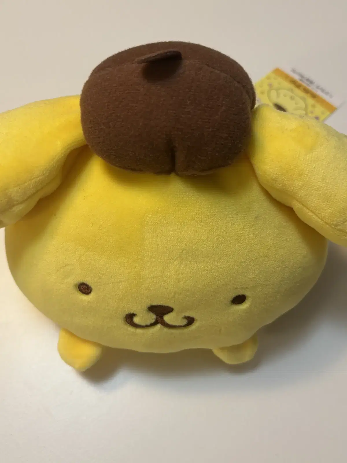 Mochimochi Korokoro Baby Pompompurin Doll