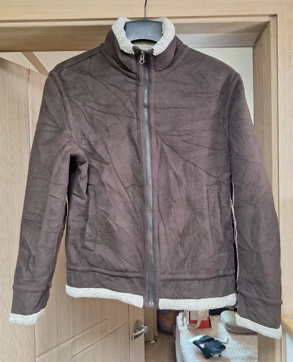 Unused Uniqlo unisex winter tax leather jacket size M (see photo for measurements)