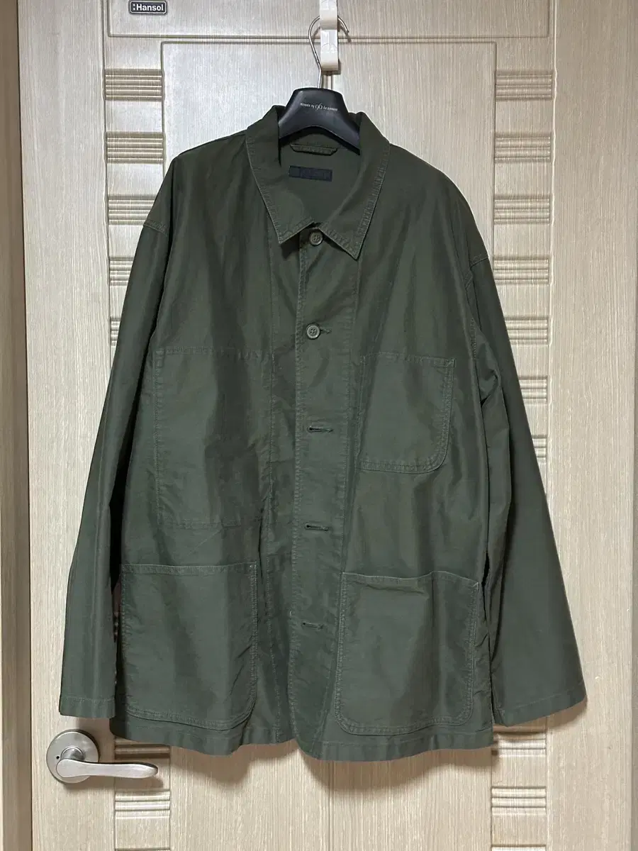 Uniqlo utility work jacket for sale.