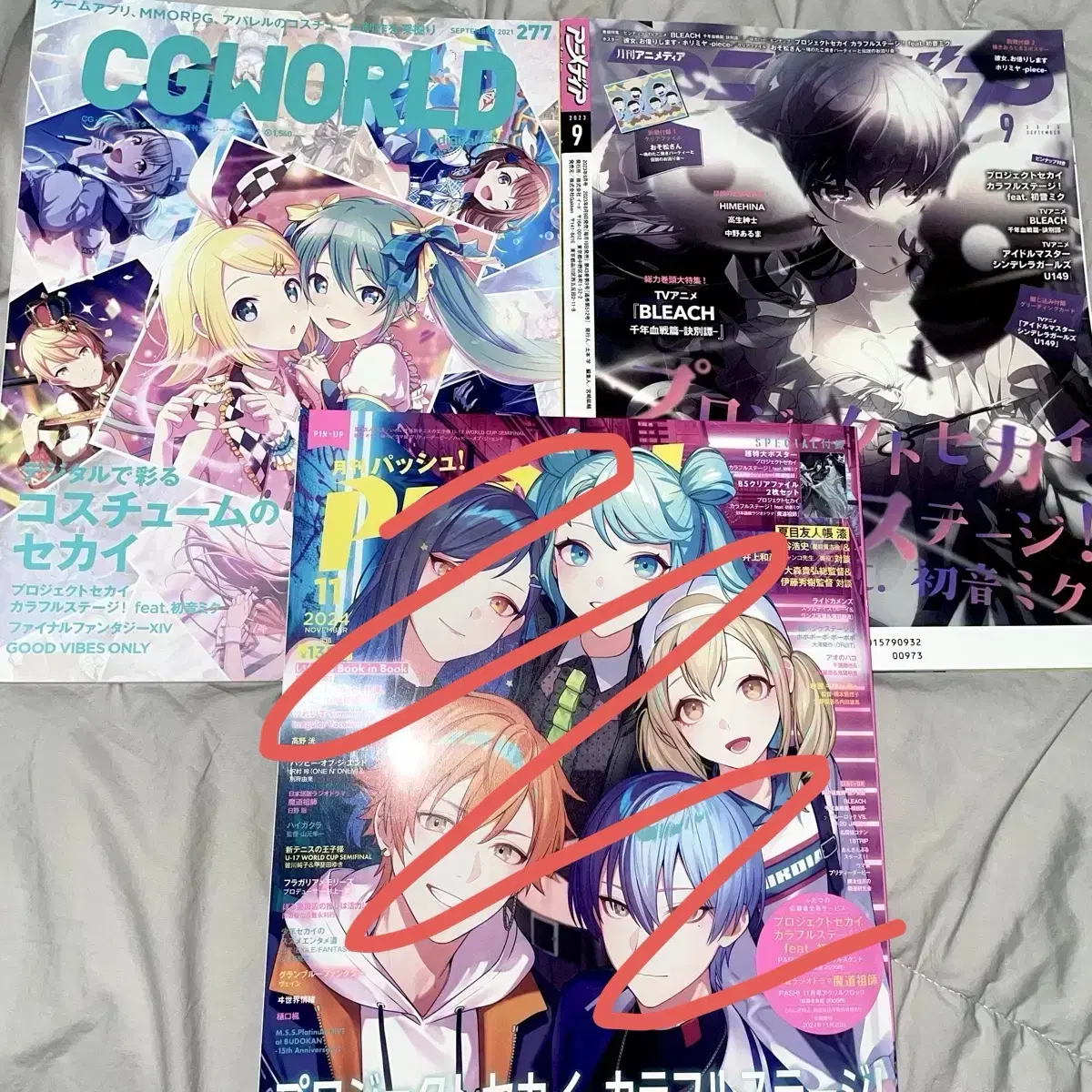 Japanese magazines with prosecco vivas-oriented covers (Bizrog PASH! Animedia, etc.)