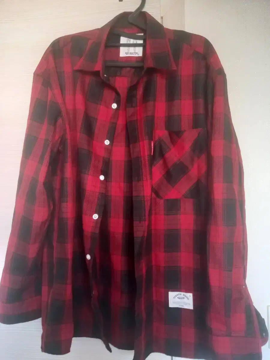 Check shirt in good condition sells size 105