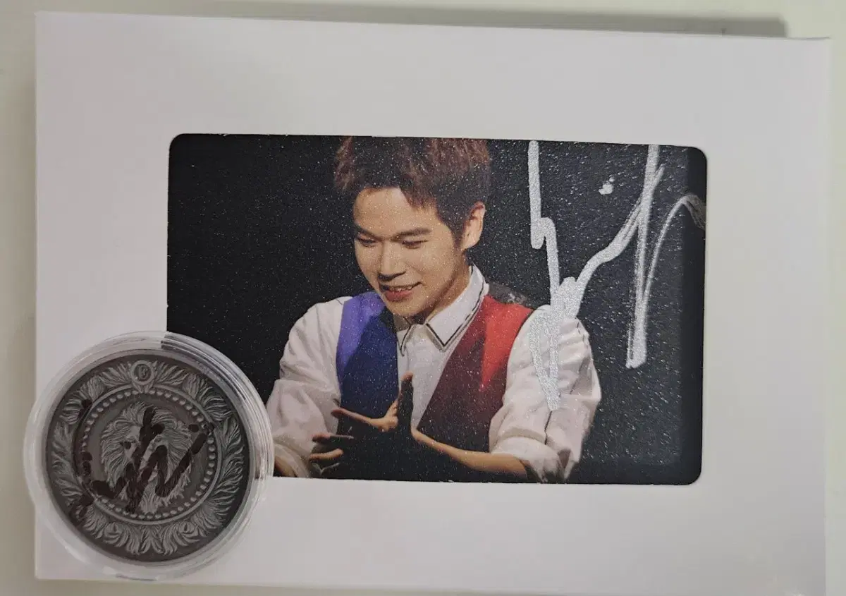 [The Magic Star](autographed) Eric Chen postcard + Eric Chen Leon coin for sale.