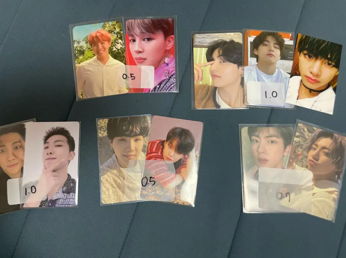 BTS photocards are stacked on top of each other bulk wts 