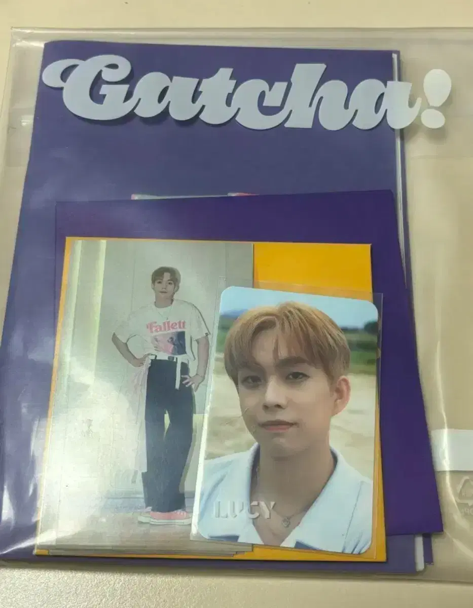 Lucy Gacha unsealed album with photocard