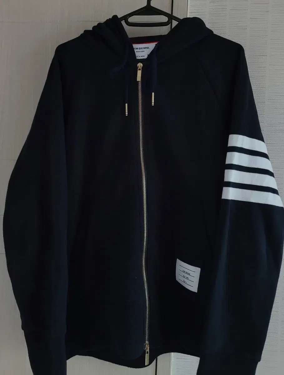 I am selling [size 4] Thom Browne 4 bar hoodie.