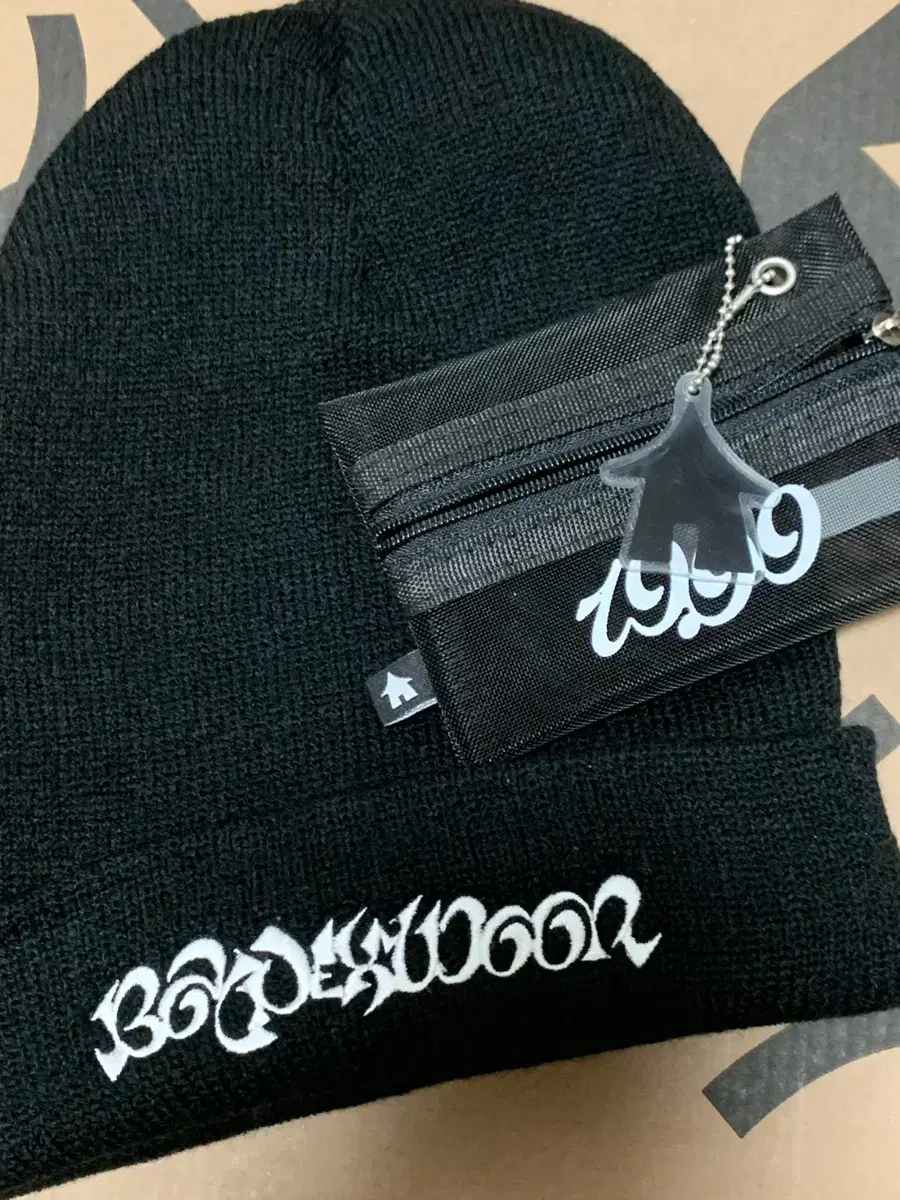 boynextdoor showcase sells beanies + kard wallets