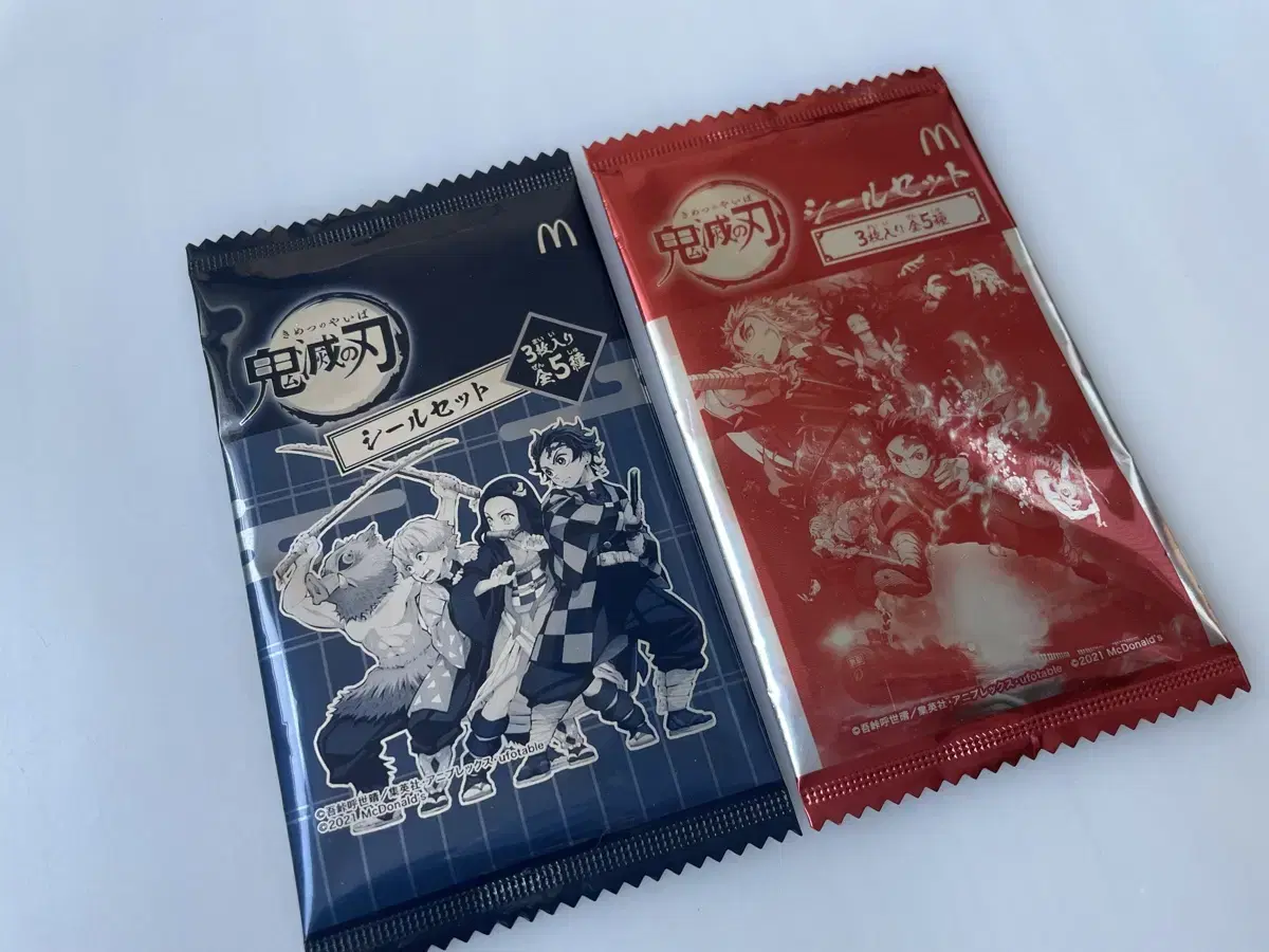 Two Demon Slayer kard stickers sealed limited to McDonald's in Japan.