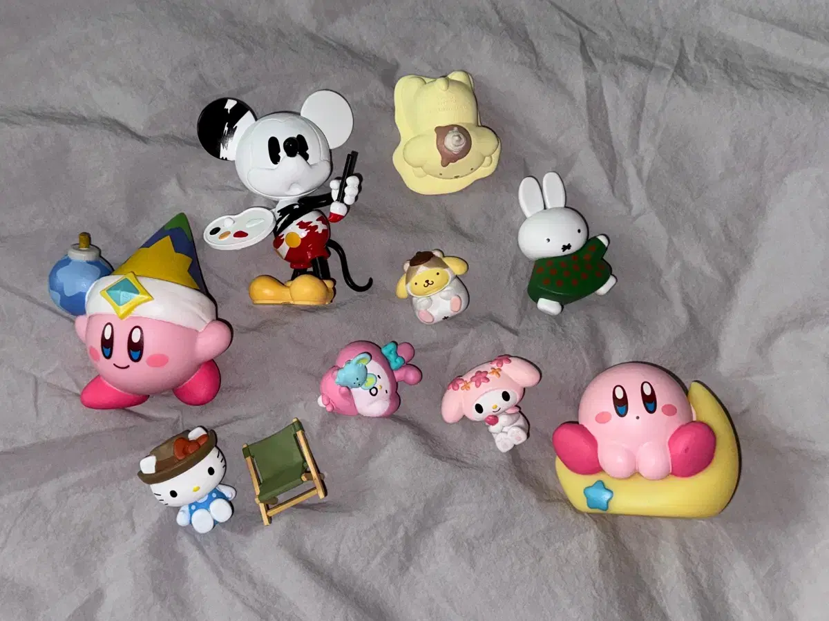 Kirby, San Rio, and Pop Mart Disney Mickey Figures.