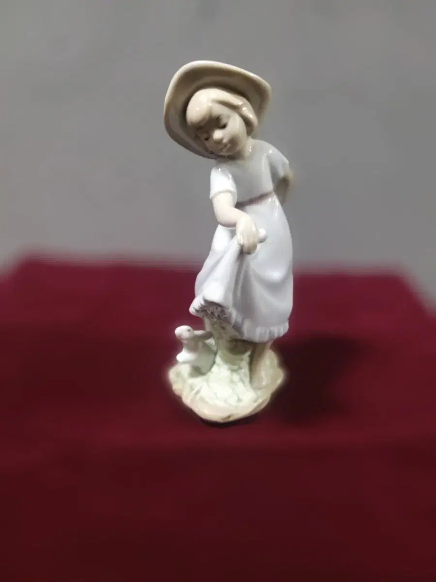 Porcelain Bunny and the Little Girl in the Hat