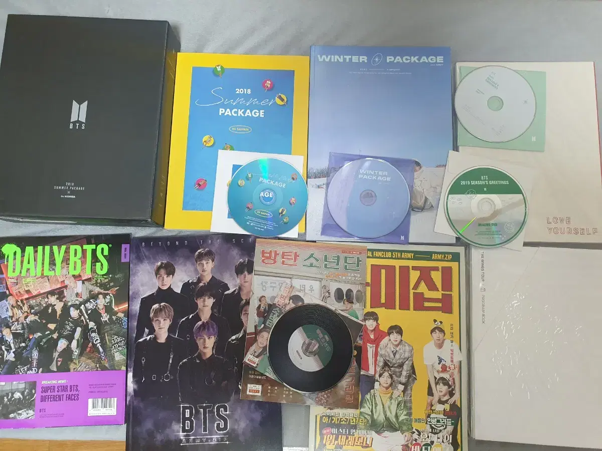 bangtan official goods sells in bulk sumpap winwin seasons greetings ami zip photobook etc bts