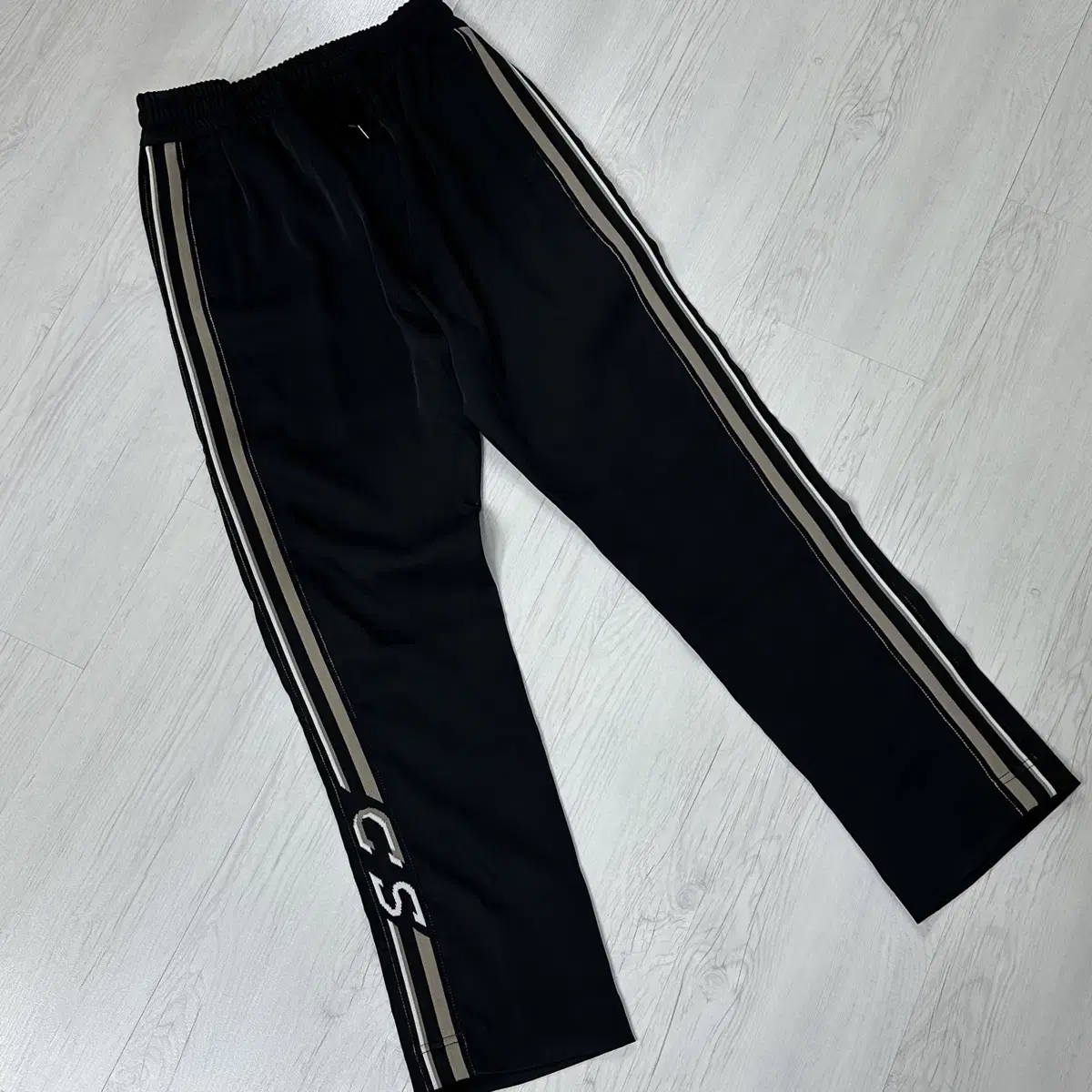 Sell CMMN SWDW (Common Sweden) training pants.