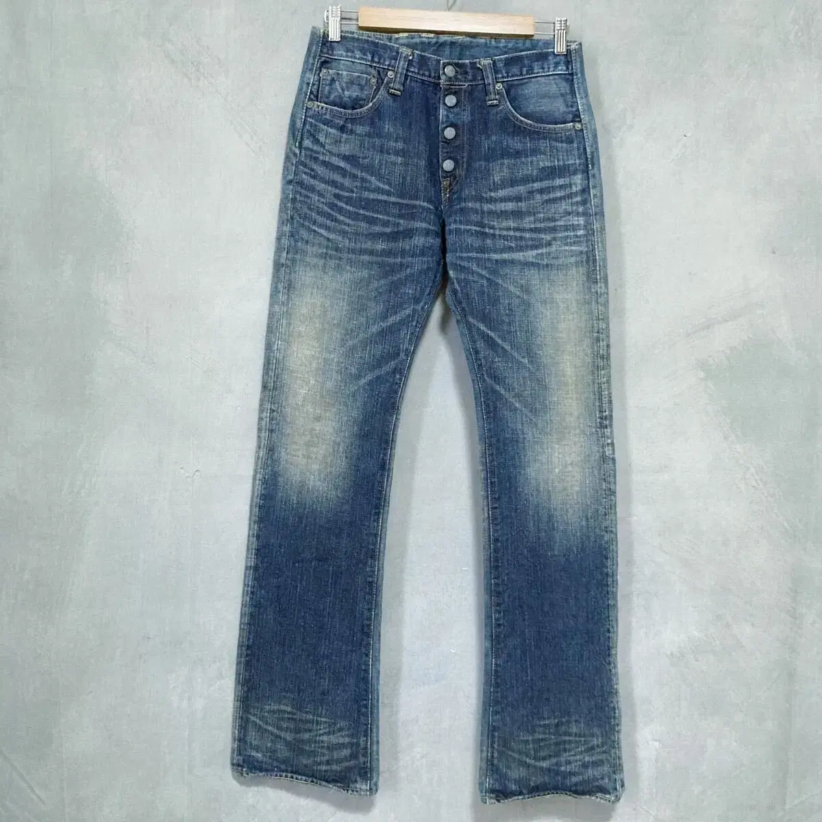 Yasuhiro Mihara x Sugarcane flared denim pants