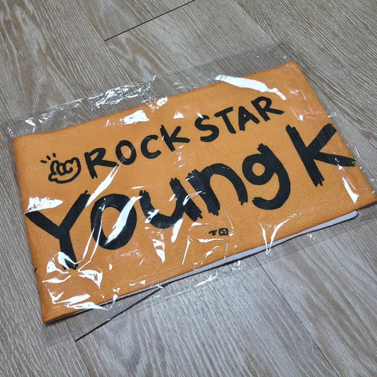 Day 6 Young K Rockstar Towel slogan (letter)