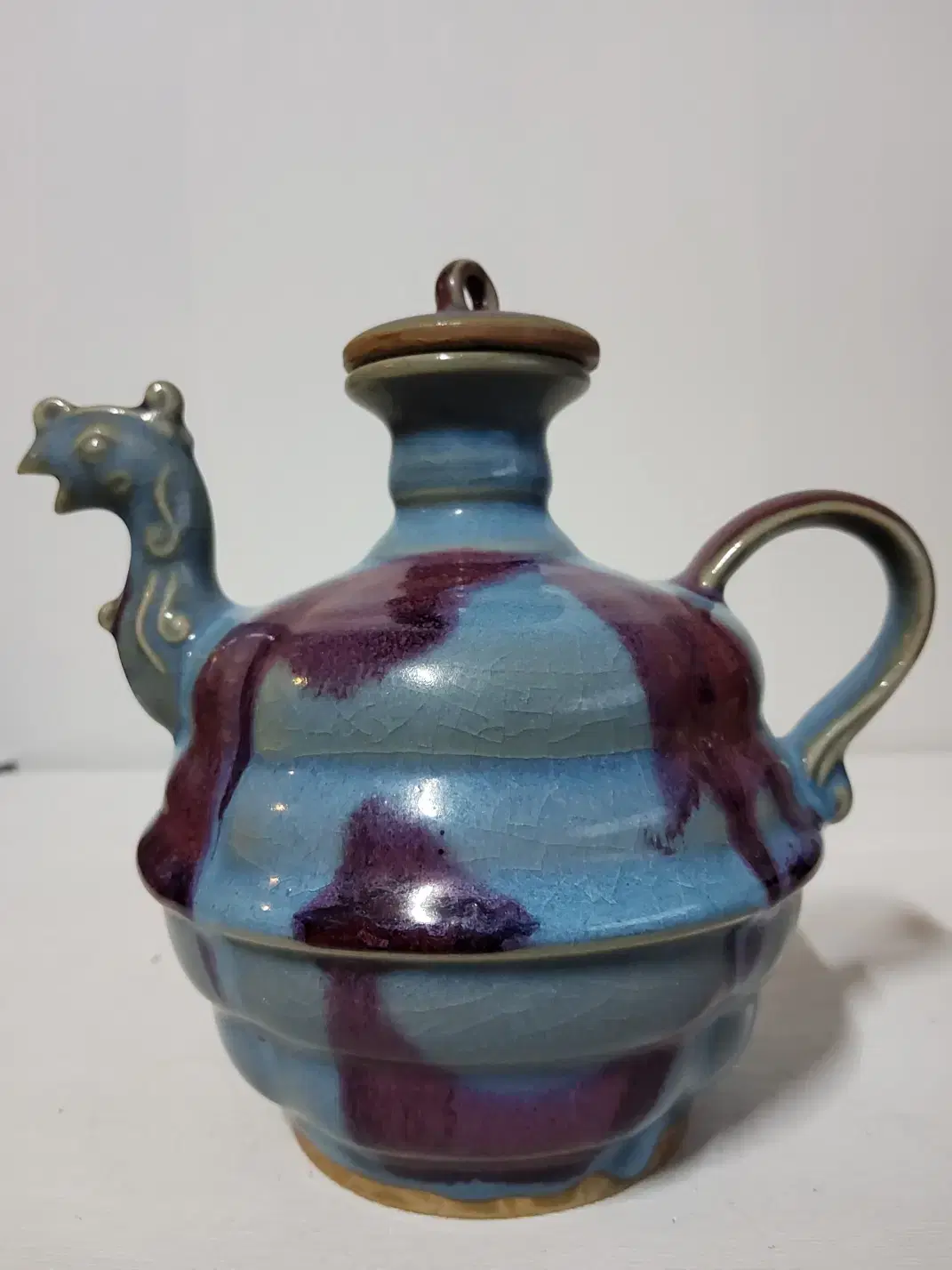 Selling a Qing Dynasty guanyu zhuizhi teapot. Organizing the collection of the seller.