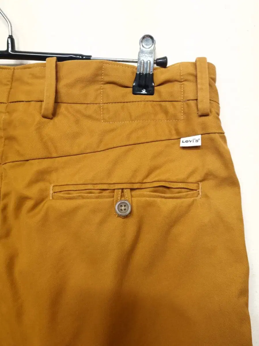 Levi's mustard colored chino pants 30-31 inches