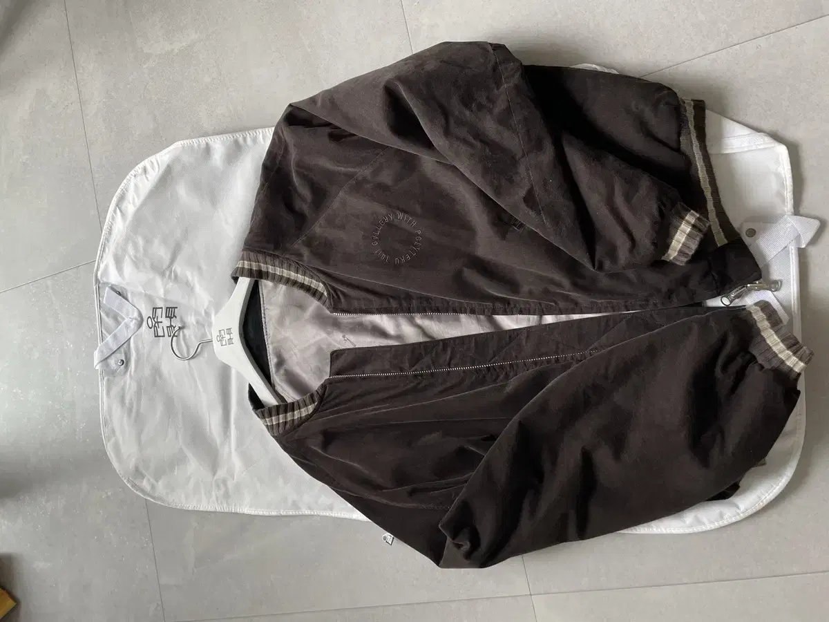 First edition polythene lew subveneer jacket, size 4, sold.