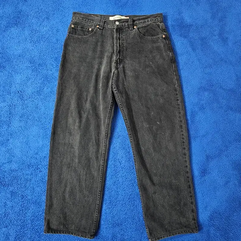 Levi's 550 Relaxed Fit Black and Blue Denim Pants 34