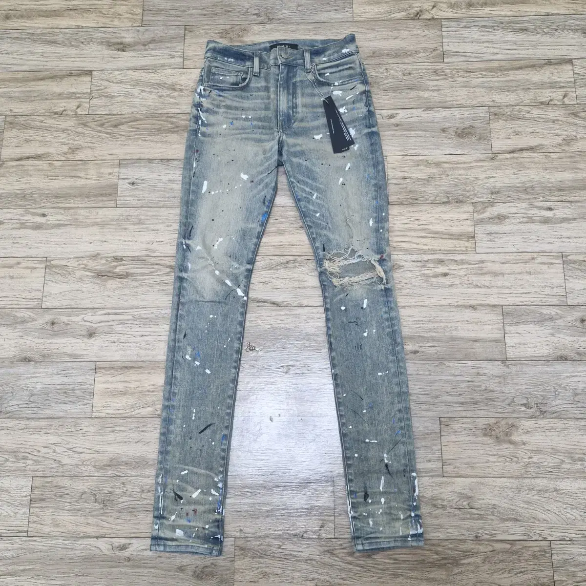 *In-store* [29] Amiri Artist Broken Paint Splatter Desert Denim Jin