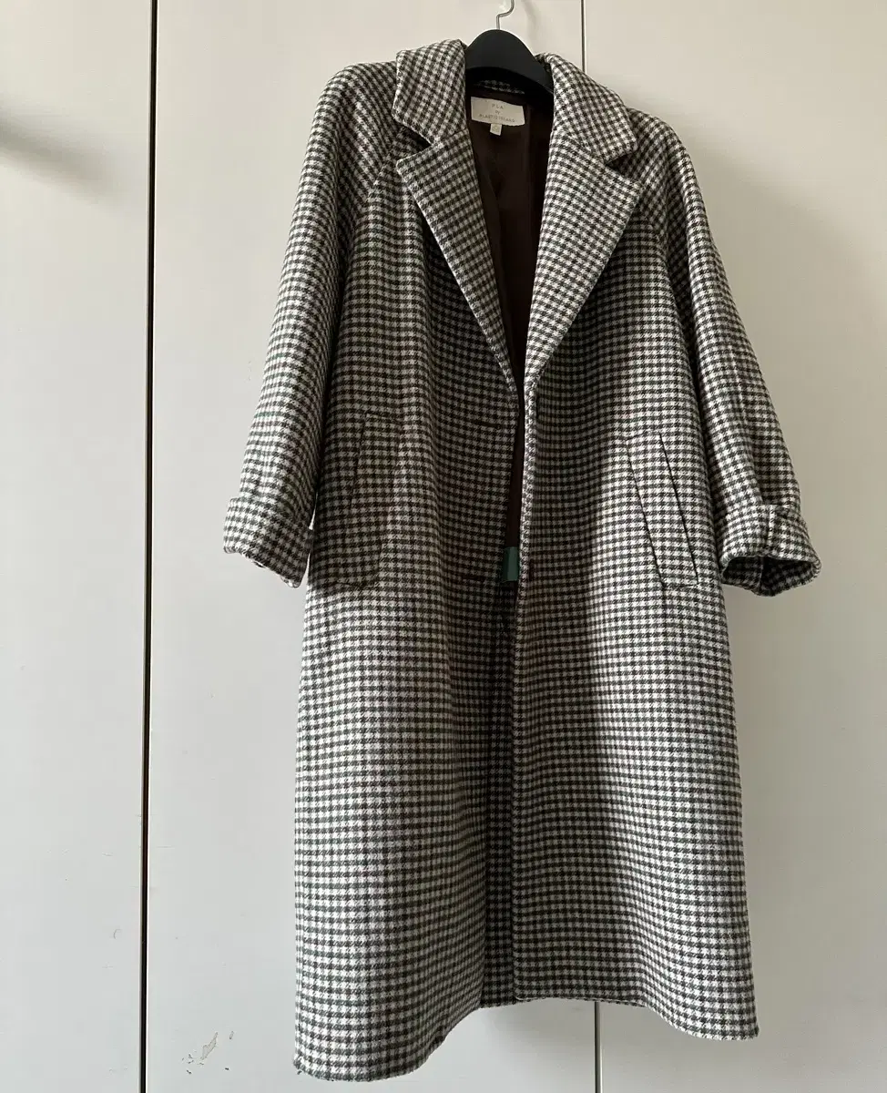 Check design. Wool coat for winter