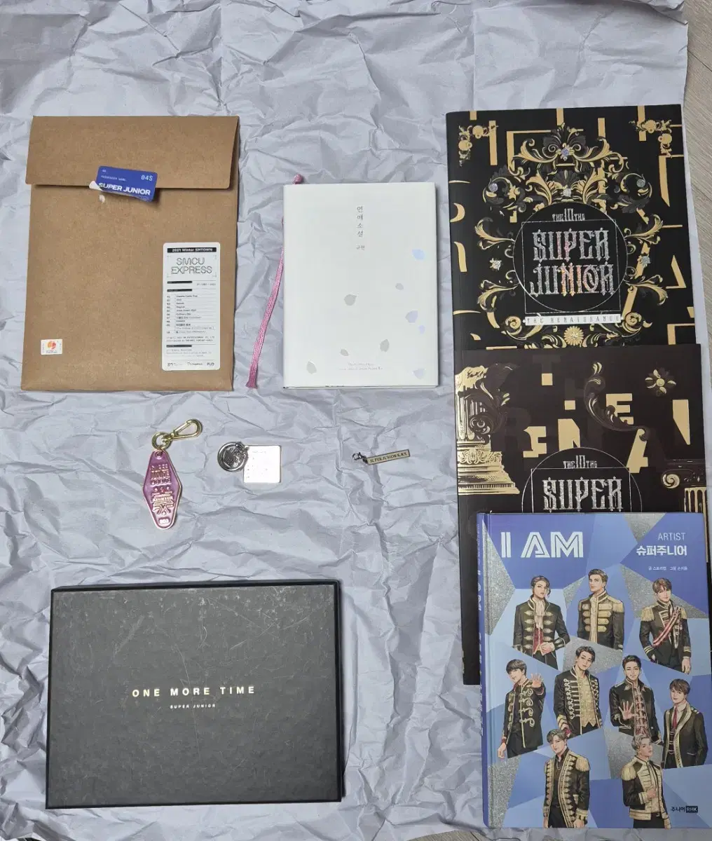 Super Juniors album and merchandise.