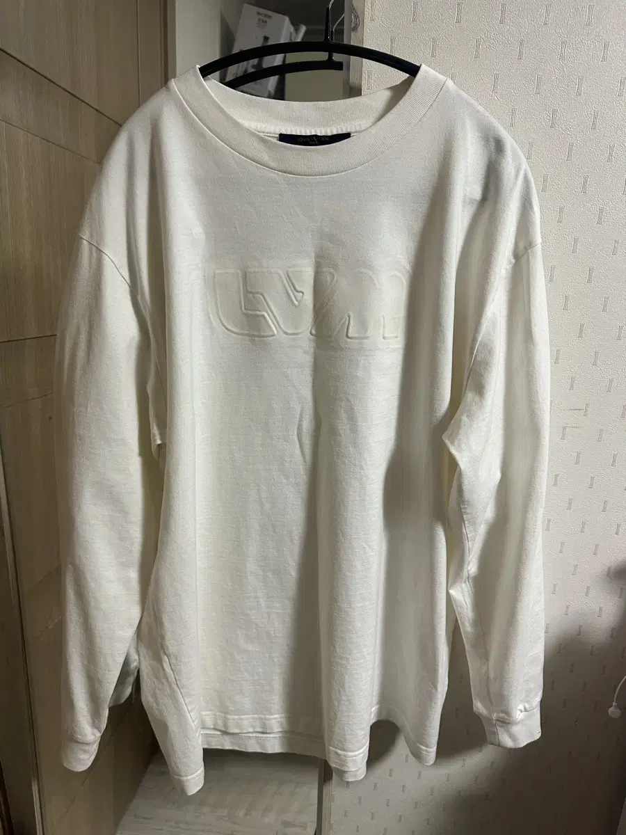 Louis Vuitton embossed LV long sleeve t-shirt for sale.