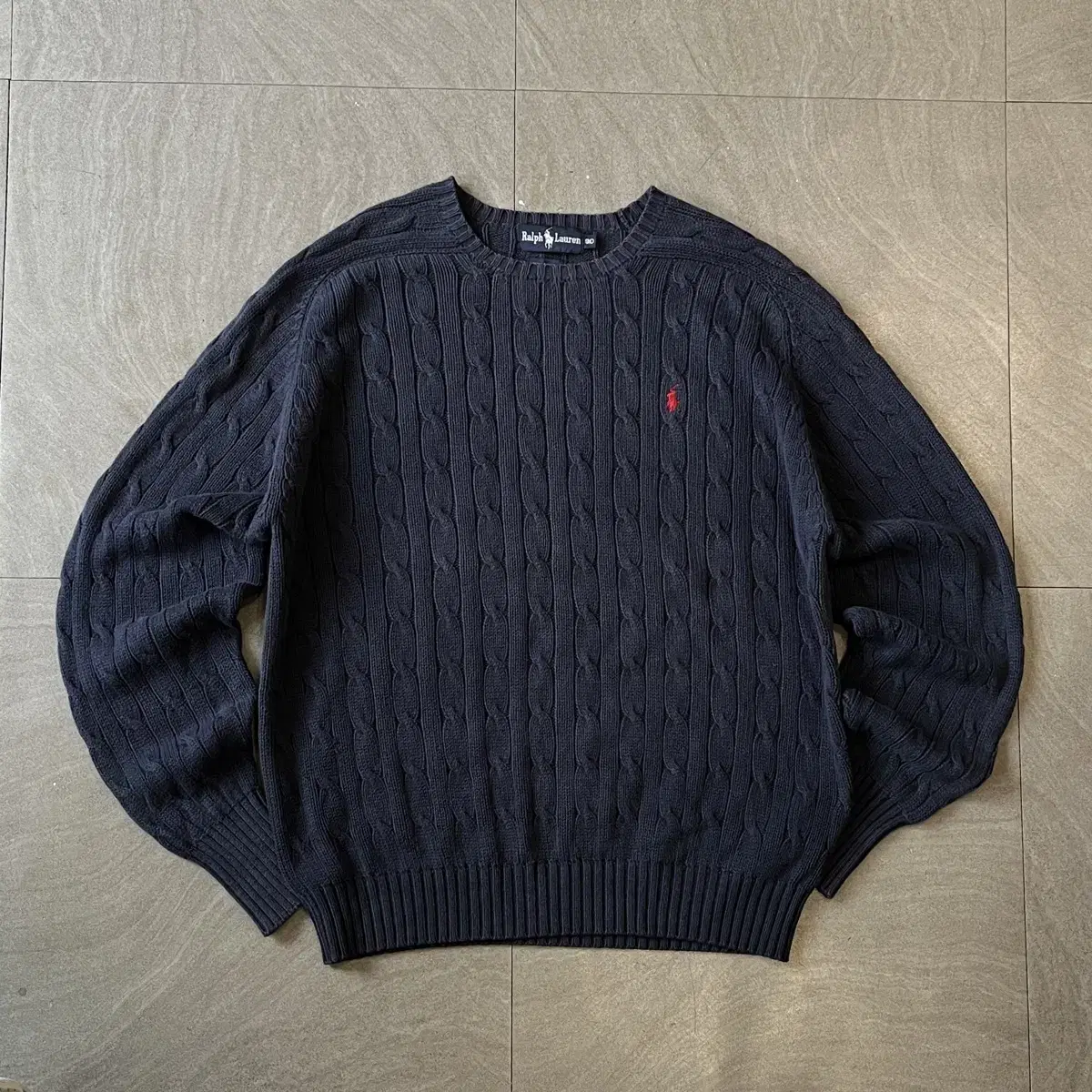 Polo navy cable-stitch knit produced November 90