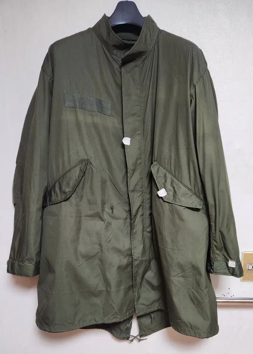 M65 Fishtail Medium Unused, brand new but has discoloration from front to back